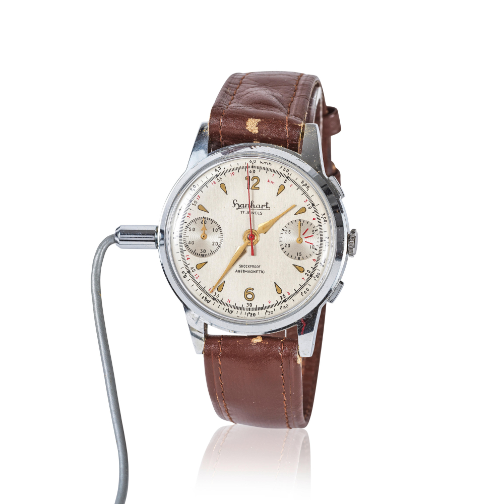 Hanhart. An exceptional and unexpected stainless steel recording device in the form of a wristwatch with a small tape recording device 'Minifon attaché' in leatherette carrying case