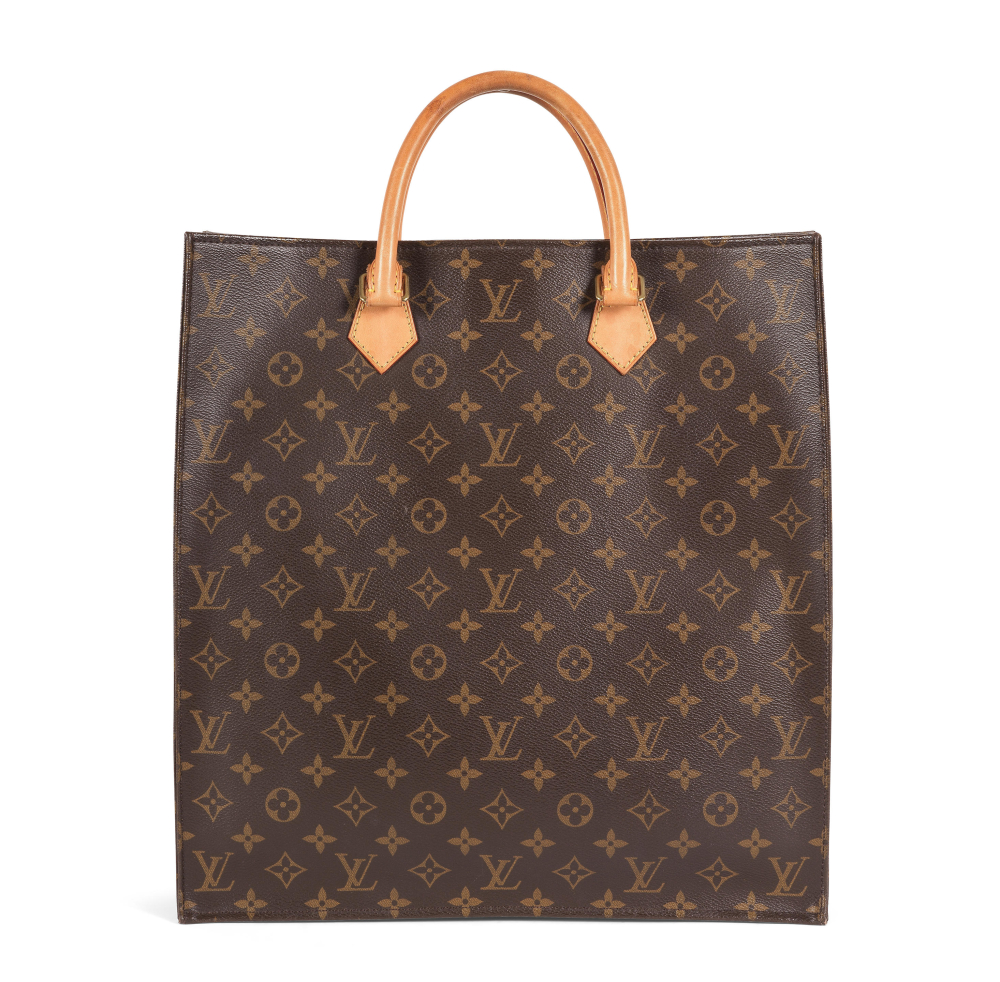 Louis VUITTON. Sac Plat en toile Monogram et cuir naturel.