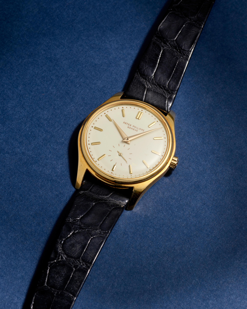 PATEK PHILIPPE. A FINE 18K GOLD AUTOMATIC WRISTWATCH