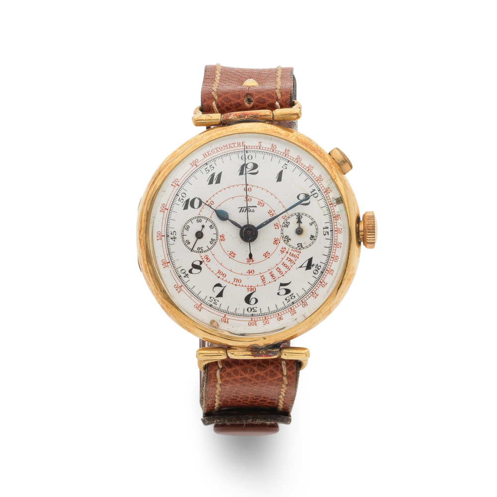 Titus. An 18K gold manual wind monopusher chronograph wristwatch