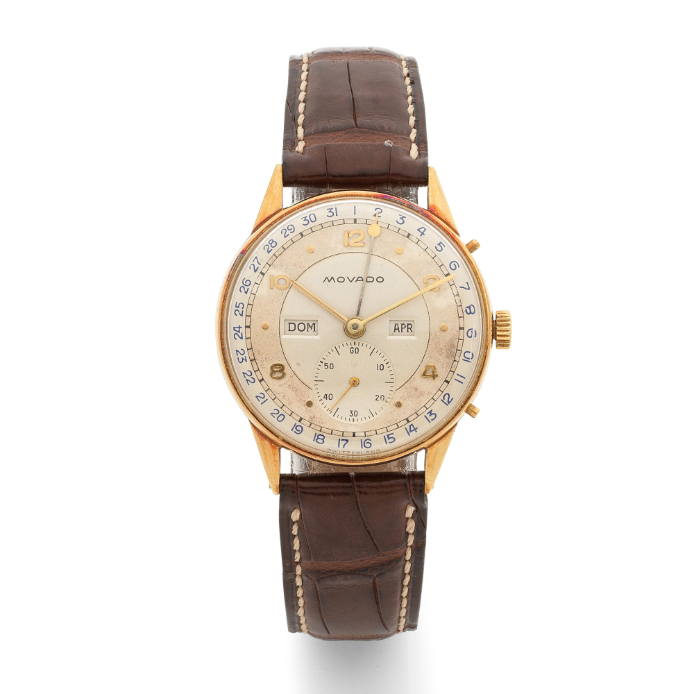 Movado. A fine 18K gold triple calendar manual wind wristwatch