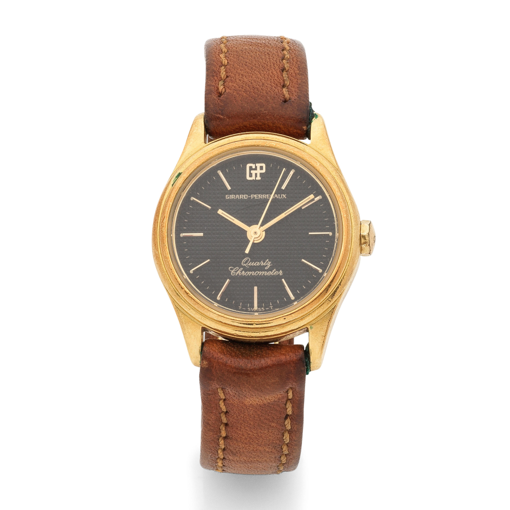 Girard-Perregaux. A lady's 18K gold quartz wristwatch