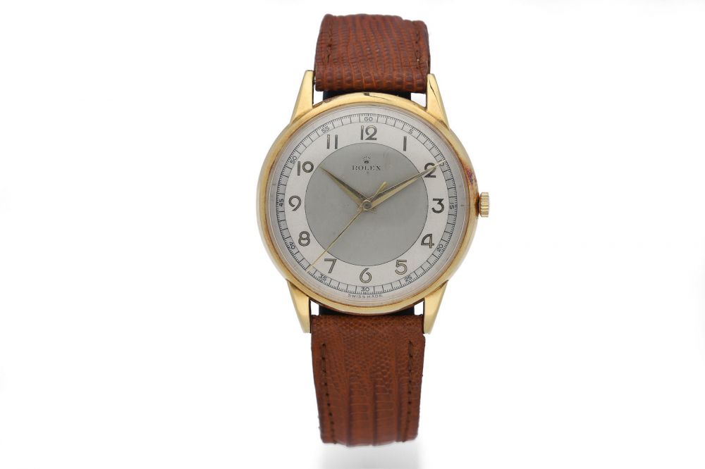 Rolex. A Yellow Gold Wristwatch with Two-Tone Dial
