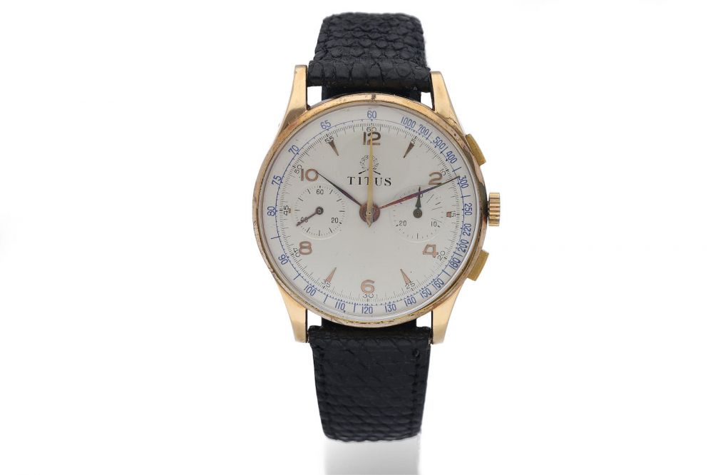 Titus. A Yellow Gold Manual Wind Chronograph Wristwatch