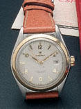 Rolex. A stainless steel automatic calendar watch