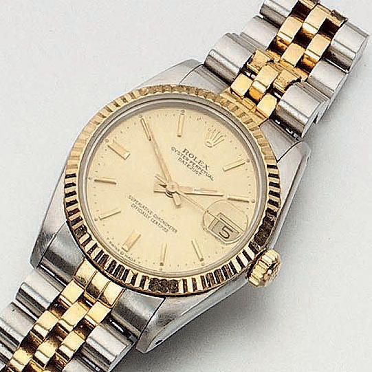Rolex. A steel and gold mid-size automatic calendar wristwatch