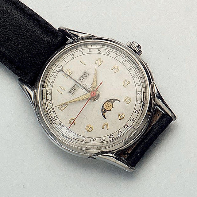 Helbros. A chrome plated triple calendar wristwatch