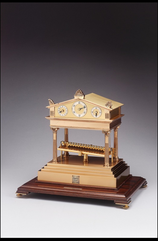 A modern lacquered brass limited edition Congreve Rolling Ball Clock