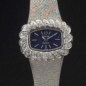 Rolex. A lady's 18ct white gold diamond set wristwatch