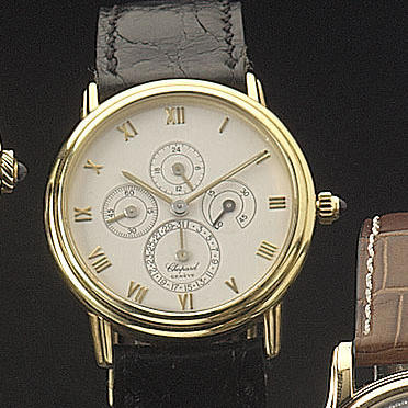 Chopard. An 18ct gold calendar automatic wristwatch with power reserve and 24 hour indication
