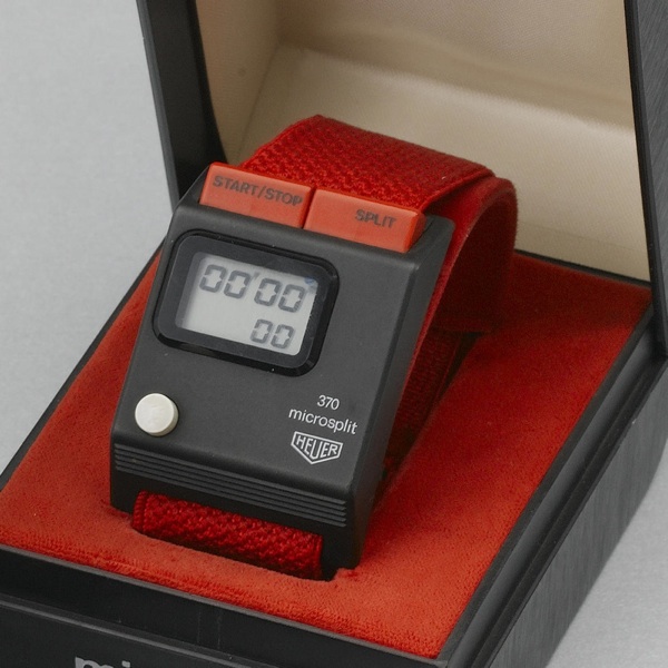 Heuer. A rare split digital stopwatch with original box