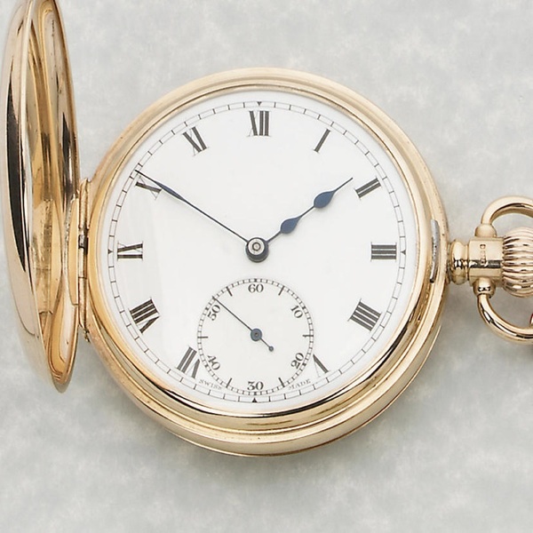 Vertex. A 9ct gold half hunter pocket watch together with a 9ct gold curb link chain