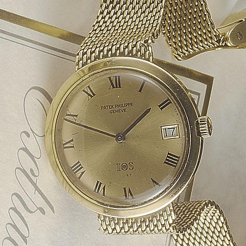 Patek Philippe. An 18 carat gold automatic calendar bracelet watch made especially for IOS and presented to their best clients, members of the IOS Million Dollar Association