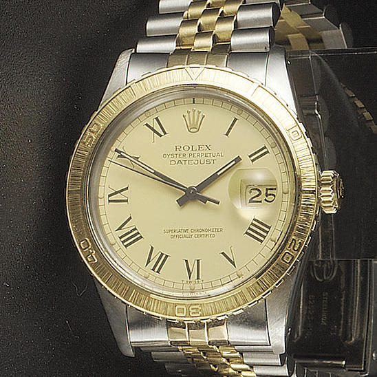 Rolex. A steel and gold automatic calendar wristwatch
