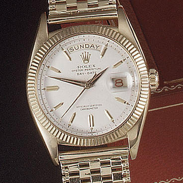 Rolex. A fine 18ct gold automatic calendar bracelet watch