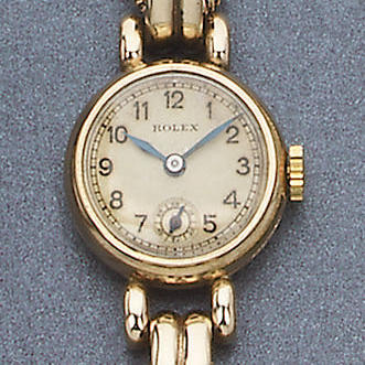 Rolex. A lady's 9ct gold bracelet watch
