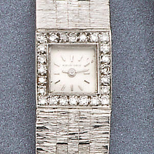 Beuche Girod. A lady's 18ct white gold and diamond set bracelet watch with another white metal stone set watch