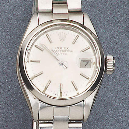 Rolex. A lady's steel automatic calendar bracelet watch