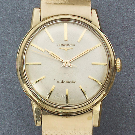 Longines. A gents 9ct gold automatic wristwatch