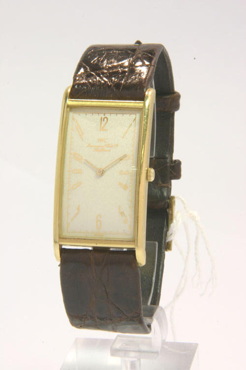 IWC. A gents 18ct gold quartz rectangular wristwatch