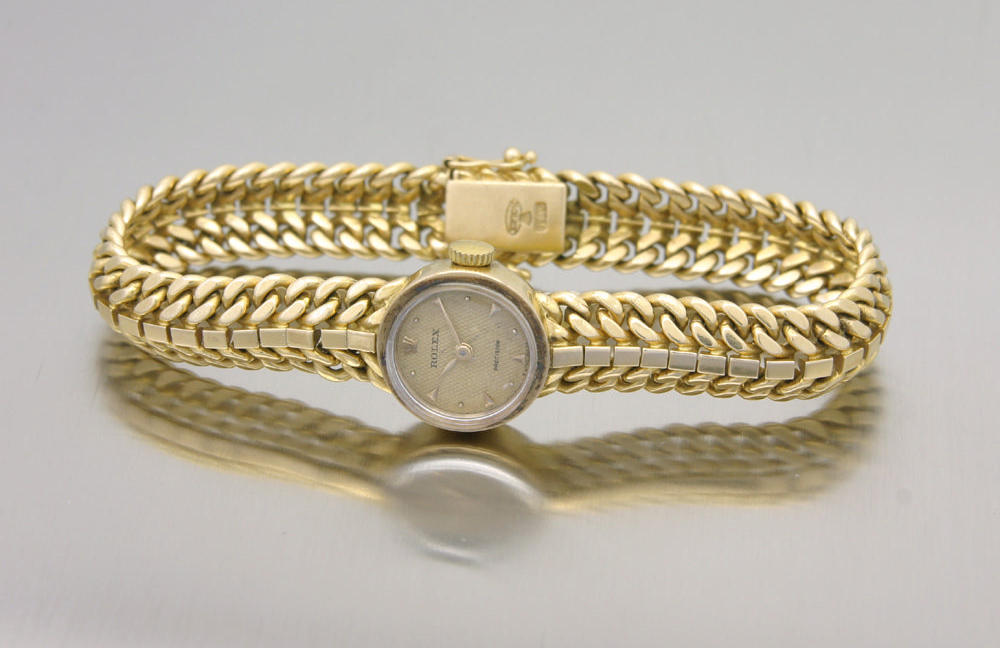 Rolex. A lady's 18ct gold bracelet watch
