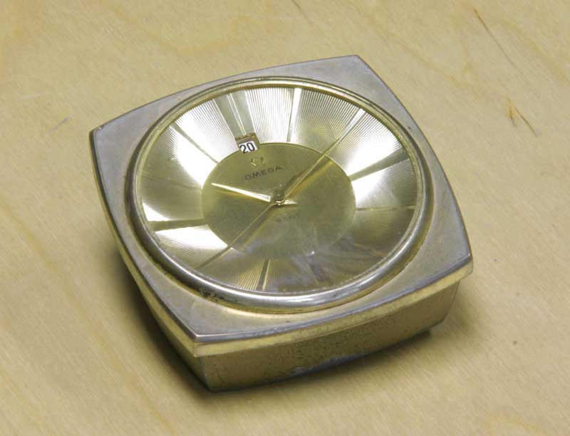 Omega. An unusual eight day watchmakers workbench calendar timepiece