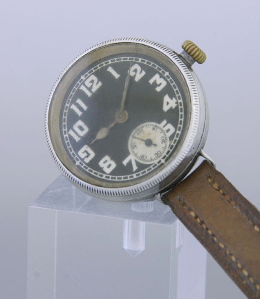 Marconi. A silver enamel dial wristwatch in 'tropical' case