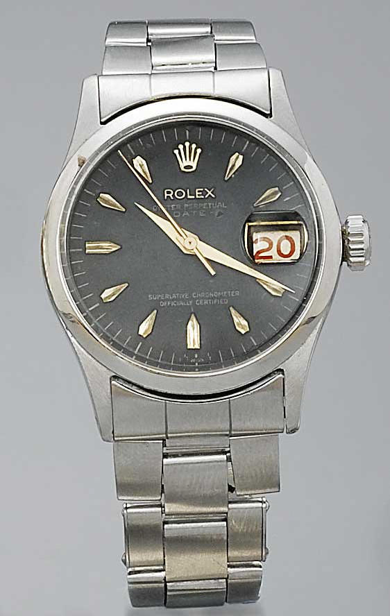 Rolex. A gents stainless steel automatic calendar bracelet watch