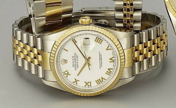 Rolex. A steel and gold automatic bracelet watch