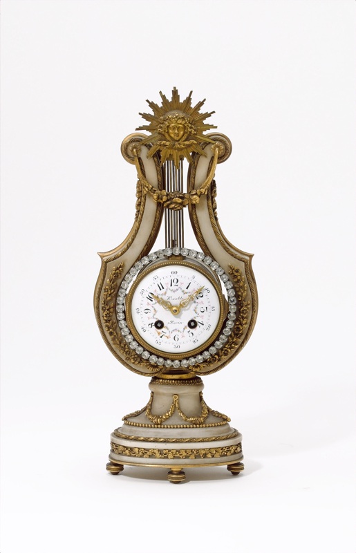A mid 19th century gilt metal and marble Lyre clock