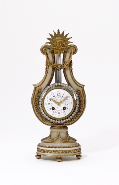 A mid 19th century gilt metal and marble Lyre clock