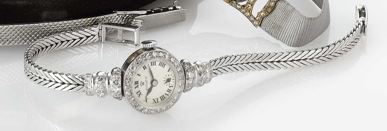 Rolex. A platinum and diamond set bracelet watch