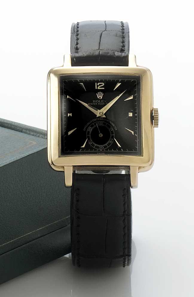 Rolex. A fine and rare 18ct rose gold square cased automatic wristwatch