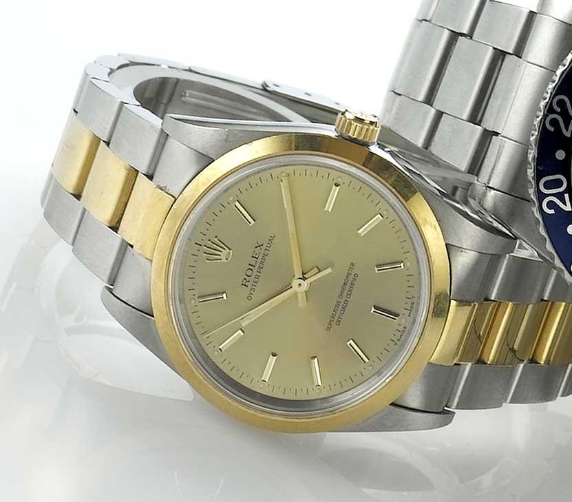 Rolex. A steel and gold automatic wristwatch with box and papers