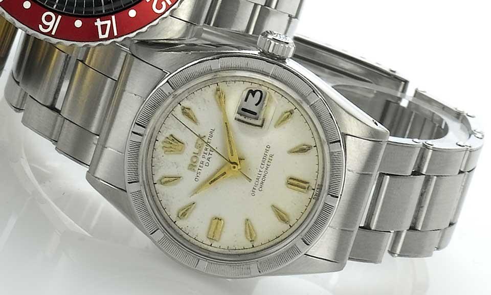 Rolex. A stainless steel automatic centre second wristwatch