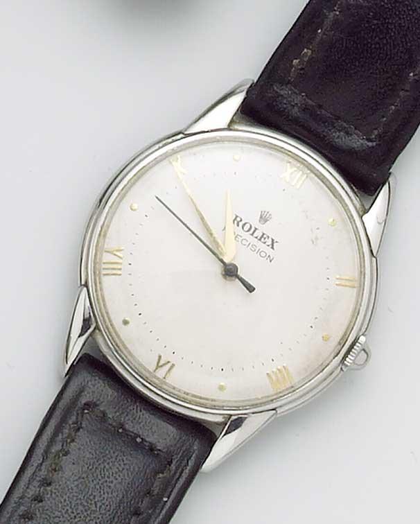 Rolex. A stainless steel centre seconds wristwatch on leather strap