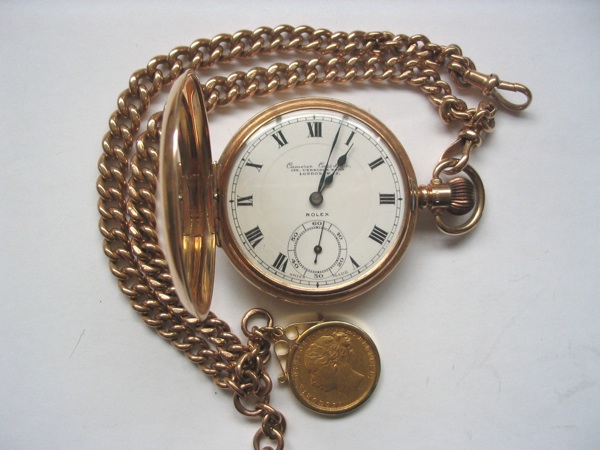 A 9ct gold full hunter pocket watch with chain