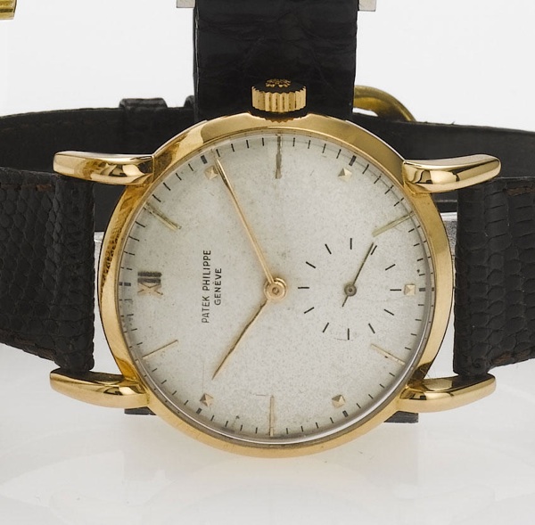Patek Philippe. An 18ct rose gold wristwatch with downturned lugs