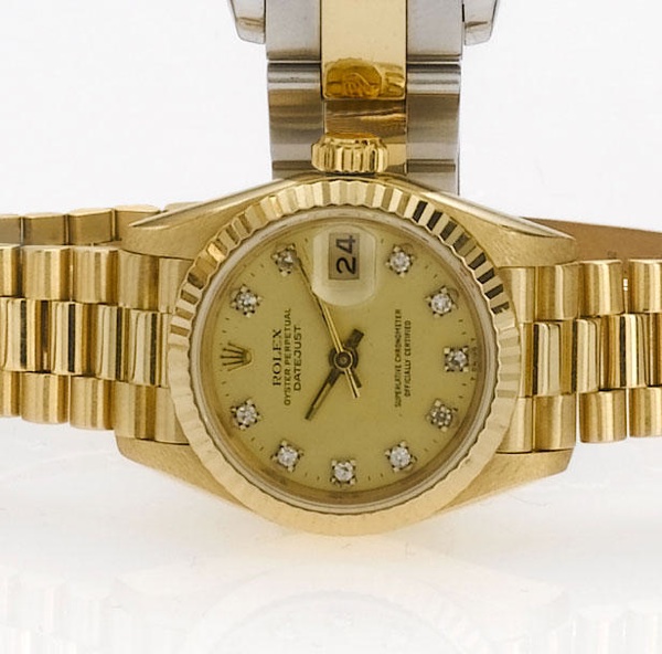 Rolex. An 18ct gold and diamond set automatic bracelet watch