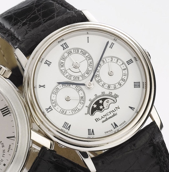 Blancpain. A fine platinum perpetual calendar wristwatch with box papers