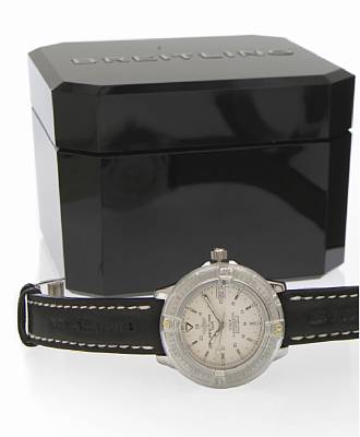 Breitling. A stainless steel self-winding calendar wristwatch with revolving bezel