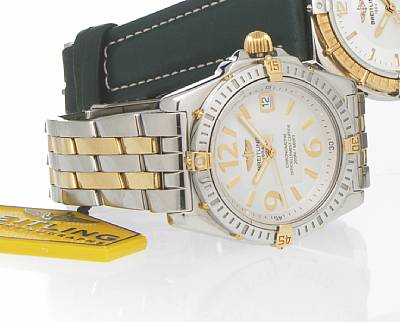 Breitling. A mid-size stainless steel and gold capped quartz bracelet watch