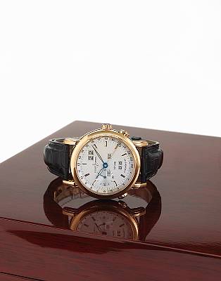 Ulysse Nardin. An 18k rose gold limited edition self-winding perpetual calendar dual time-zone wristwatch