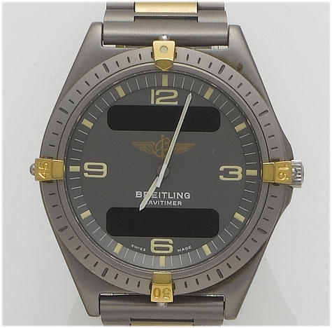 Breitling. A titanium analogue and LCD digital display wristwatch