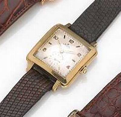 Rolex. A square steel and gold self-winding wristwatch