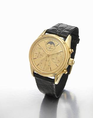 Ulysse Nardin. A fine and rare 18k gold split-seconds chronograph calendar wristwatch with phases of the moon