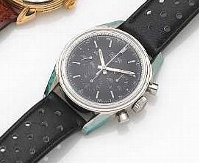 Heuer. A stainless steel chronograph wristwatch with black dial