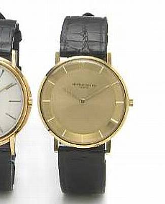 Vacheron Constantin. An 18k gold slim round cased wristwatch