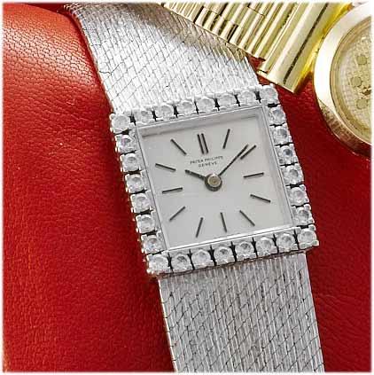 Patek Philippe. A lady's 18ct white gold diamond set bracelet watch with fitted box