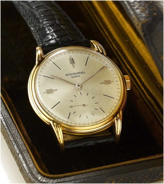 Patek Philippe. A fine and rare 18ct rose gold wristwatch together with original Patek Philippe fitted box and Certificate of Origin